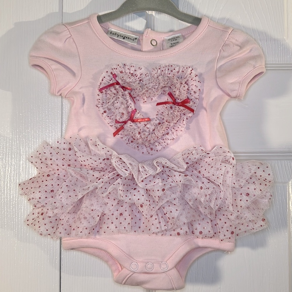 Newborn pink bodysuit with tutu